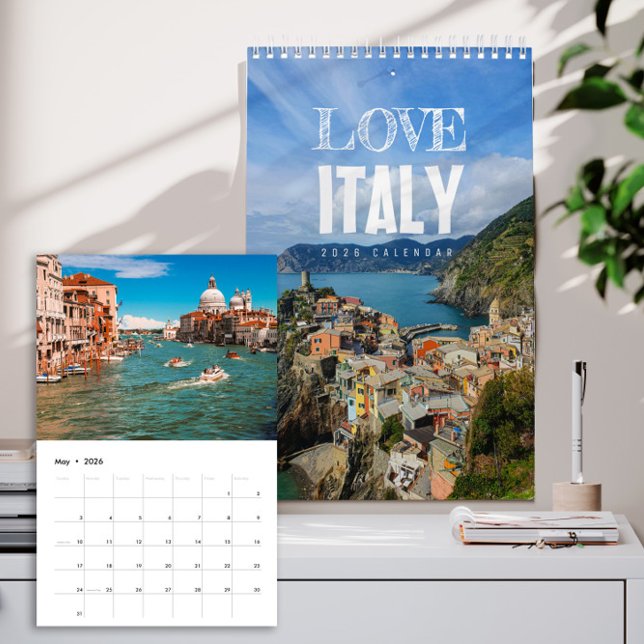 Calendário 2026 Amor Itália (Italy 2026 wall calendar cover showing sunlit Italian villages, coastal views, and landscapes)