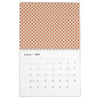 um padrão geométrico em laranja e branco