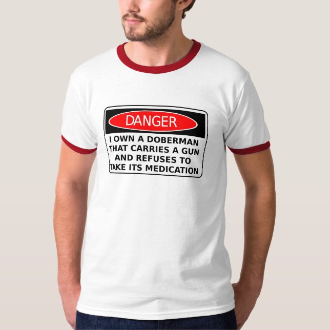Camisa engraçada humor perigoso Doberman arma (Frente)