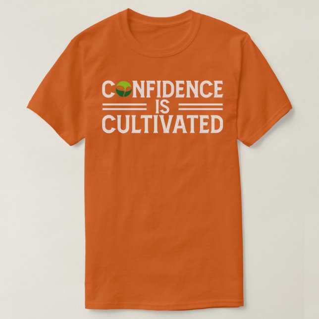 Camiseta A Confiança É Cultivada Por Uma Citação Inspirador (Frente do Design)