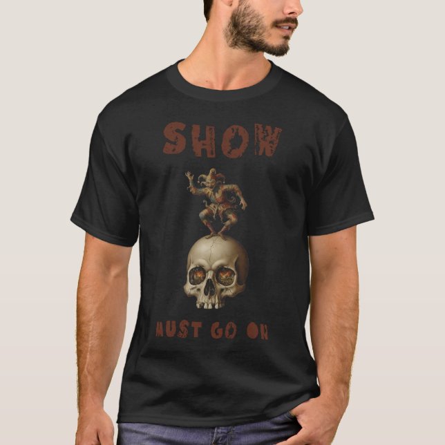 Camiseta A Dança do Idiota na Cabeça da Mortalidade: Uma Gr (Frente)