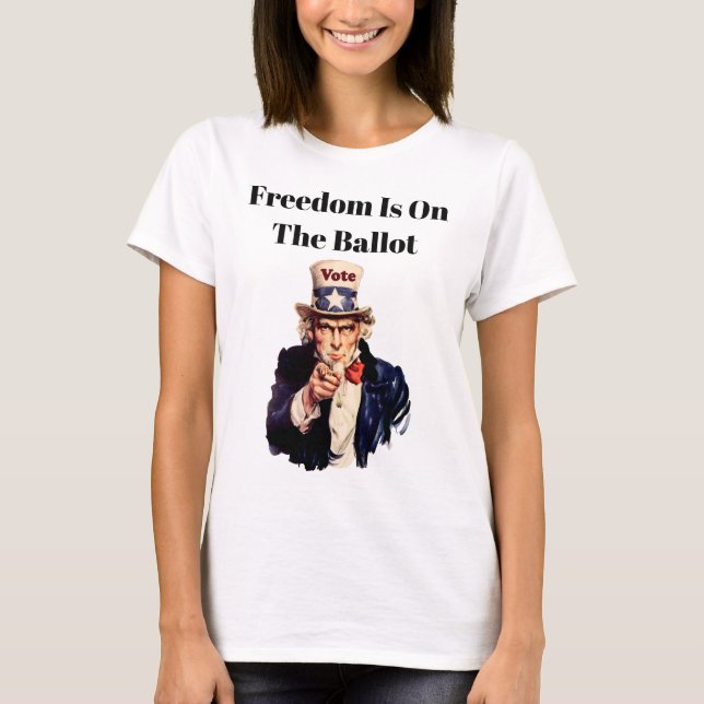 Camiseta A Liberdade Está No Balanço De 2026 (Frente)