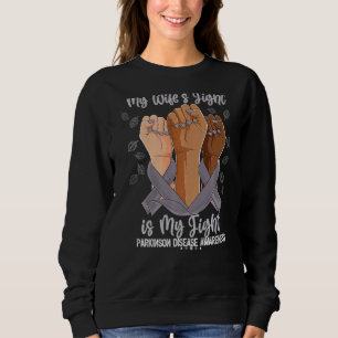 Camiseta A luta da minha mulher é a luta contra o Parkinson