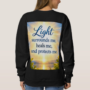 Camiseta A Luz Me Envolve, Me Cura e Me Protege.