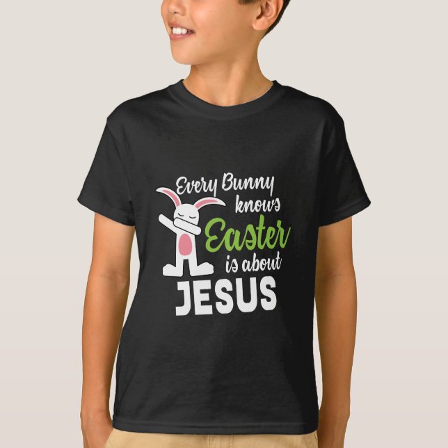Camiseta A páscoa de toque ligeiro do coelho é sobre Jesus (Frente)