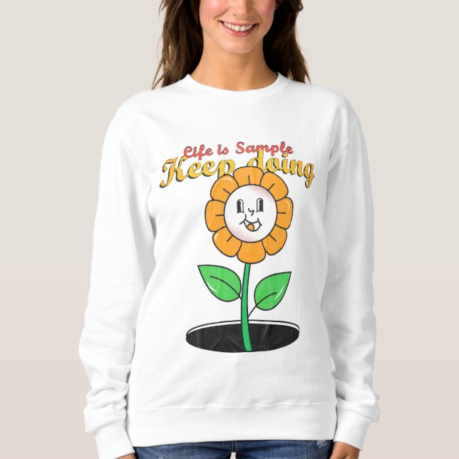 Camiseta a vida é a amostra que continua fazendo e flores (Frente)