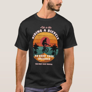 Camiseta A vida é como andar de bicicleta andando