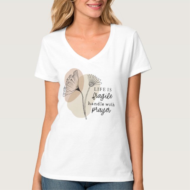 Camiseta A vida é um punho frágil com flores de oração (Frente)