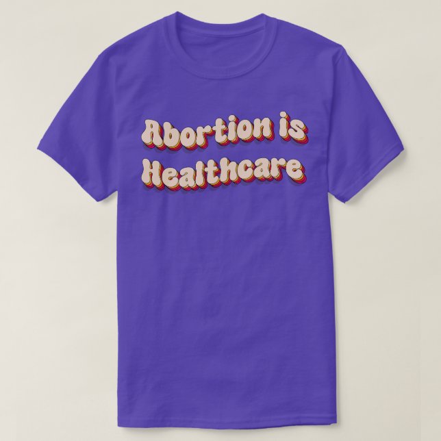 Camiseta aborto é assistência médica 1 (Frente do Design)