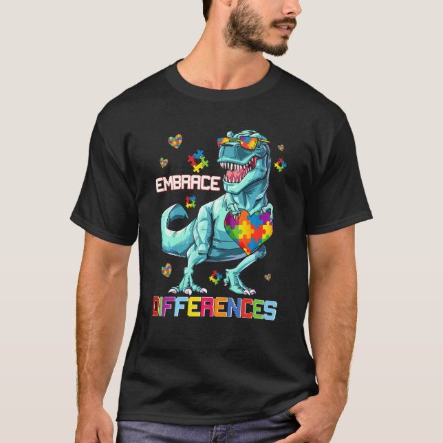 Camiseta Abraçar Diferença  Quebra-cabeça de Dinossauro Con (Frente)