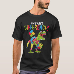 Camiseta Abraçar Diferenças Dinossauro T Rex Puzzle Autismo