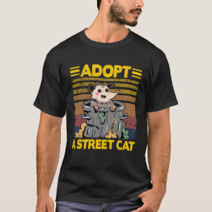 Camiseta Adote Um Gato De Rua Gambá Lixo Possum Estranho 1