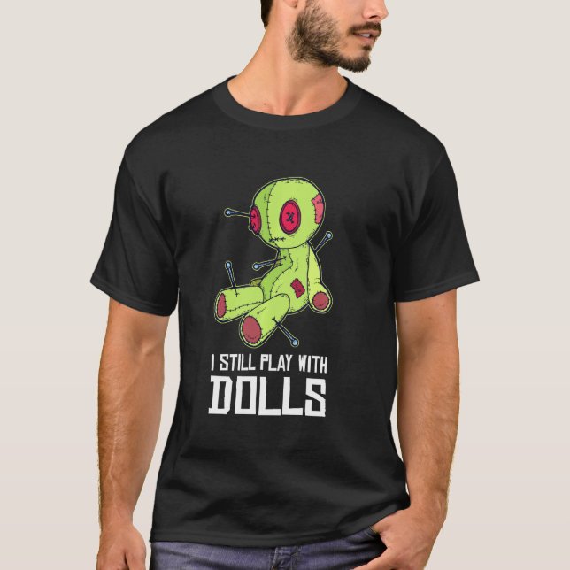 Camiseta Ainda Brinco Com Bonecas Engraçadas. (Frente)