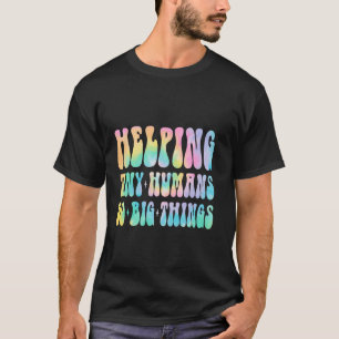 Camiseta Ajudando Pequenos Humanos a Fazerem Grandes Coisas