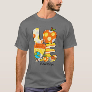 Camiseta AMAVA Maçã Docinho Professora A Vida Cai Engraçado