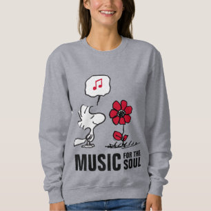 Camiseta Amendoins Woodstock Cheirando as flores