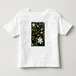 Camiseta America do Norte. Decorações do Natal na árvore