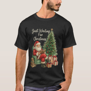Camiseta Apenas Esperando pelo Papai Noel do Natal Lendo Li