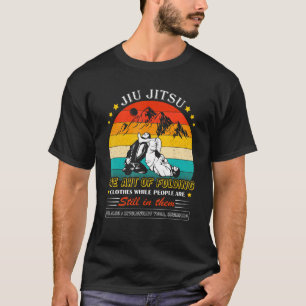 Camiseta Arte Jiu Jitsu de roupas dobráveis enquanto Pessoa