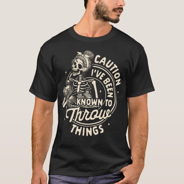 Camiseta Artista de Cerâmica de Barro Cuidado EU Fui Conhec (Frente)