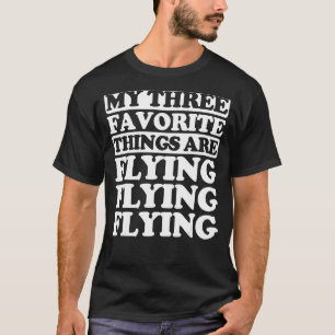 Camiseta As Minhas Três Coisas Favoritas Incluem Voar
