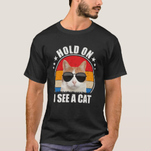 Camiseta As mulheres esperam eu vejo um gato Gato