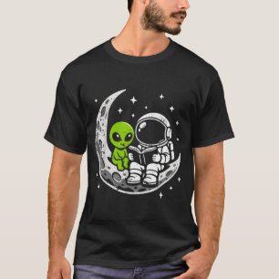 Camiseta Astronauta lendo livro alienígena lua espaço
