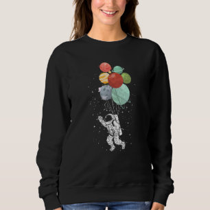 Camiseta Astronauta Segurando Planeta Balões Espaciais Míst