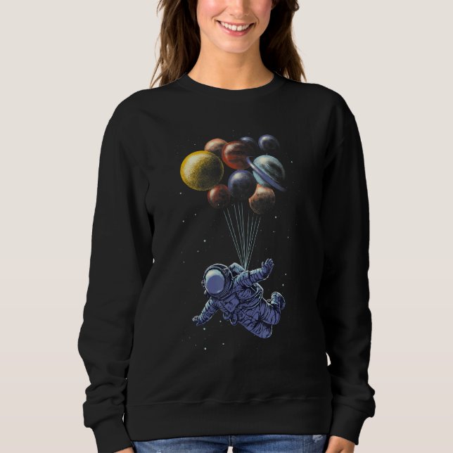 Camiseta Astronauta Segurando Planeta Balões Sistema Solar  (Frente)