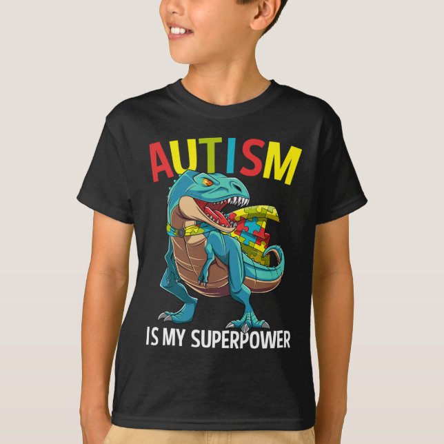 Camiseta Autismo É Meu Superpoder Peça de Puzzle de Dinossa (Frente)