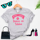 Camiseta Bachelorette de Grupo Engraçado Mais Provavelmente<br><div class="desc">Esta camiseta engraçada é perfeita para algumas boas risadas. Ele apresenta um design humorístico e leve, com a mensagem perfeita "Mais propenso a dançar no mesa". Um design hilário que faz você se sentir bem e rir alto com senso de humor. Uma obrigação para a festa de solteira e/ou para...</div>