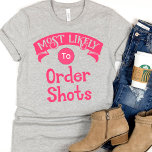 Camiseta Bachelorette engraçada mais propensa a fazer dispa<br><div class="desc">Esta camiseta engraçada é perfeita para algumas boas risadas. Ele apresenta um design humorístico e iluminado, com uma mensagem perfeita "Muito provável de fazer ordens". Um design hilário que faz você se sentir bem e rir alto com senso de humor. Uma obrigação para a festa de solteira e/ou para a...</div>