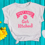 Camiseta Bachelorette engraçada mais propensa a ser apanhad<br><div class="desc">Esta camiseta engraçada é perfeita para algumas boas risadas. Apresenta um design humorístico e iluminado, com uma mensagem perfeita "Muito provável de ser apanhado". Um design hilário que faz você se sentir bem e rir alto com senso de humor. Uma obrigação para a festa de solteira e/ou para a solteira....</div>