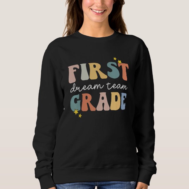 Camiseta Back to School First Grade Dream Team Groovy Teach (Frente)