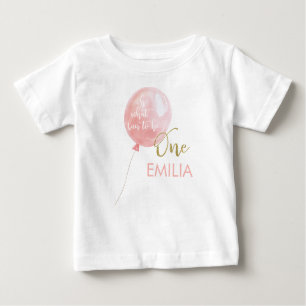 Camiseta Balão Rosa Dourado Brilho Um primeiro aniversario 