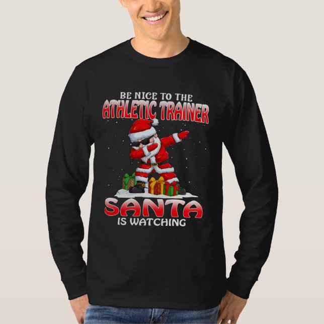 Camiseta Be Nice To The Athletic Trainer Santa Is Watching  (Frente)