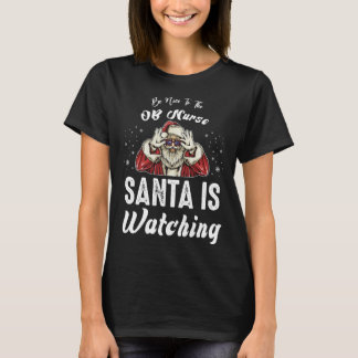 Camiseta Be Nice to The OB Nurse Santa Is Watching Christm