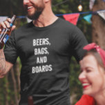 Camiseta Beers Bolsas e Conselhos Jogo de Buraco de Milho<br><div class="desc">Este design pode ser personalizado na área fornecida pela alteração da foto e/ou do texto. Ou pode ser personalizado clicando em Personalizar este Modelo e, em seguida, escolhendo o clique para personalizar mais a opção e excluir ou alterar a cor do plano de fundo, adicionar texto, alterar a cor ou...</div>