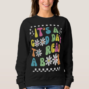 Camiseta Biblioteca É Um Bom Dia para Ler O Livro Groovy Le
