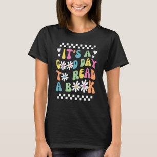 Camiseta Biblioteca É Um Bom Dia para Ler O Livro Groovy Le