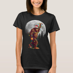 Camiseta Bigfoot Papai noel Árvore de Natal Luz Engraçada X