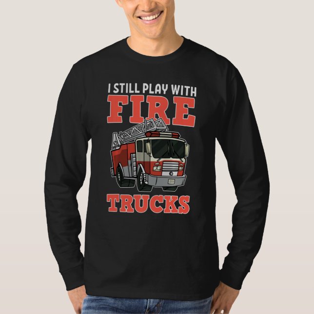 Camiseta Bombeiro Eu Ainda Brinco Com Caminhões De Fogo (Frente)