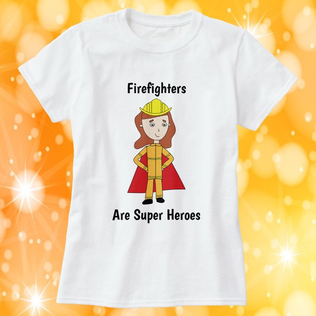 Camiseta Bombeiros são super heróis mulheres (A shirt featuring a female firefighter and the text, "Firefighters Are Super Heroes".)