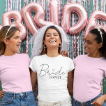 Camiseta Bride Personalized Bachelorette | Custom Name<br><div class="desc">Make the bride-to-be shine with this chic and personalized "Bride" T-shirt, featuring elegant script with a sweet heart detail and her name underneath. Perfect for bachelorette parties, bridal showers, wedding weekends, or as a fun getting-ready outfit. Comfortable, stylish, and totally Insta-worthy, this custom tee is a must-have for any modern...</div>