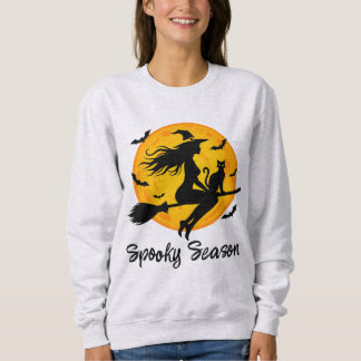Camiseta Bruxa e Gato Preto Voando Através da Lua Cheia