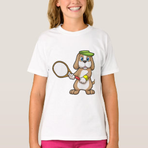 Camiseta Cachorro na Tênis com Tênis raquete e Boné