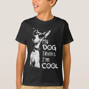 Camiseta Cachorro Por Cá Meu Cachorro Acha Que Sou Legal, E