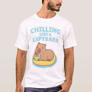 Camiseta Capybara Em Uma Piscina Flutuando Refrigerindo Com