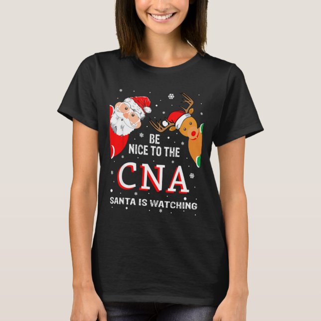 Camiseta Christmas Be Nice To The Cna Santa Is Watching  (Frente)