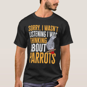 Camiseta Cinzas Africanas Pensando Em Papagaios